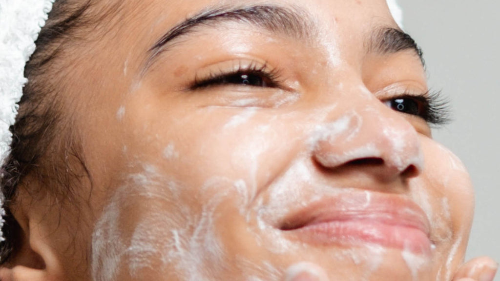 Woman applying Tailor Skincare Gel Cleanse