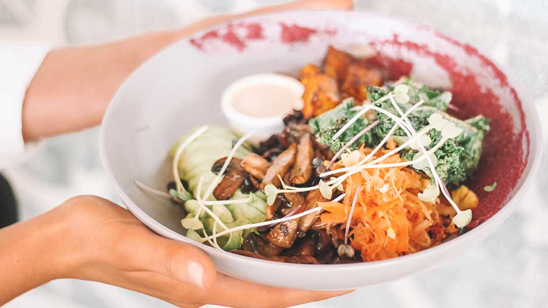 Healthy salad bowl of food for dry skin