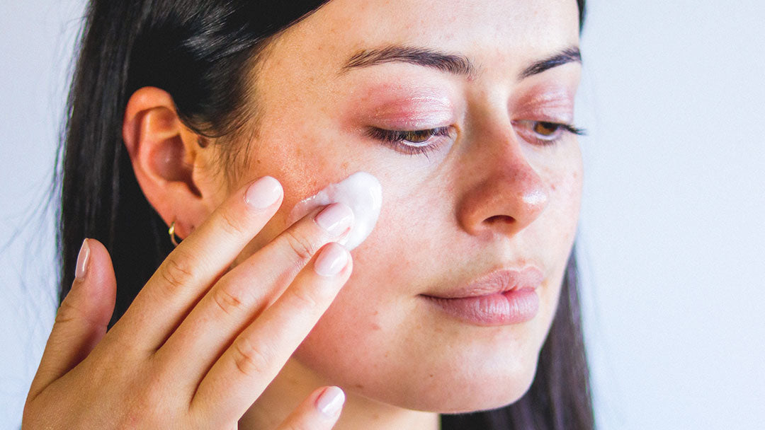 Woman Applying Everyday Facial Moisturiser
